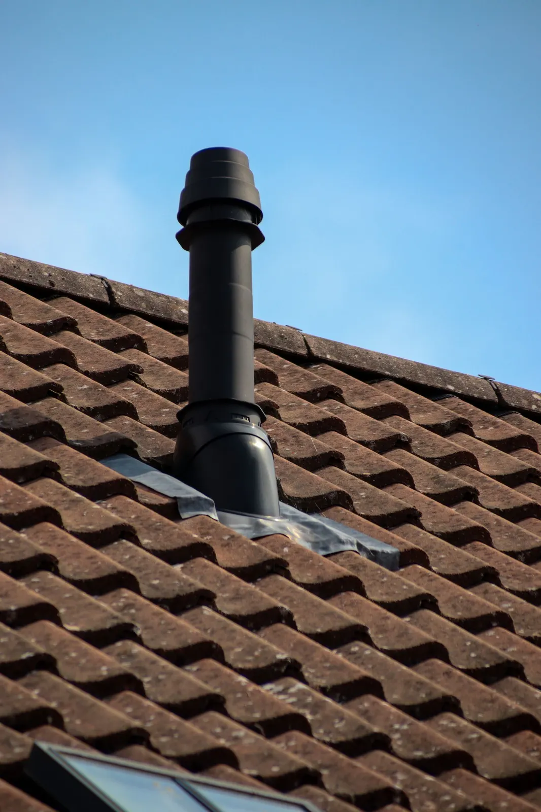 Chimney stack and tiled roof on a house in Dudley during a repair visit