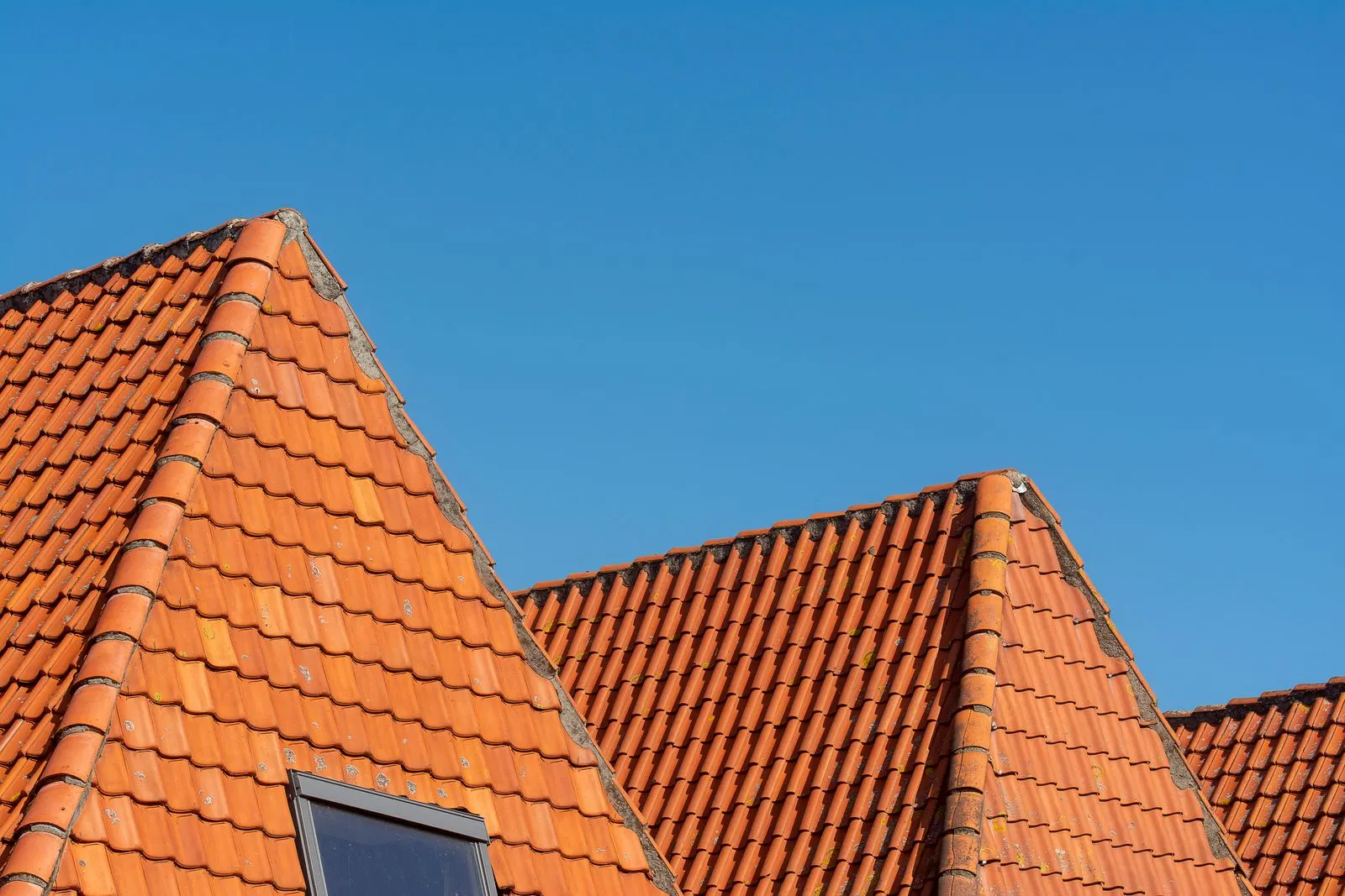 Red tiled roofs on terraced houses typical of Dudley and the Black Country